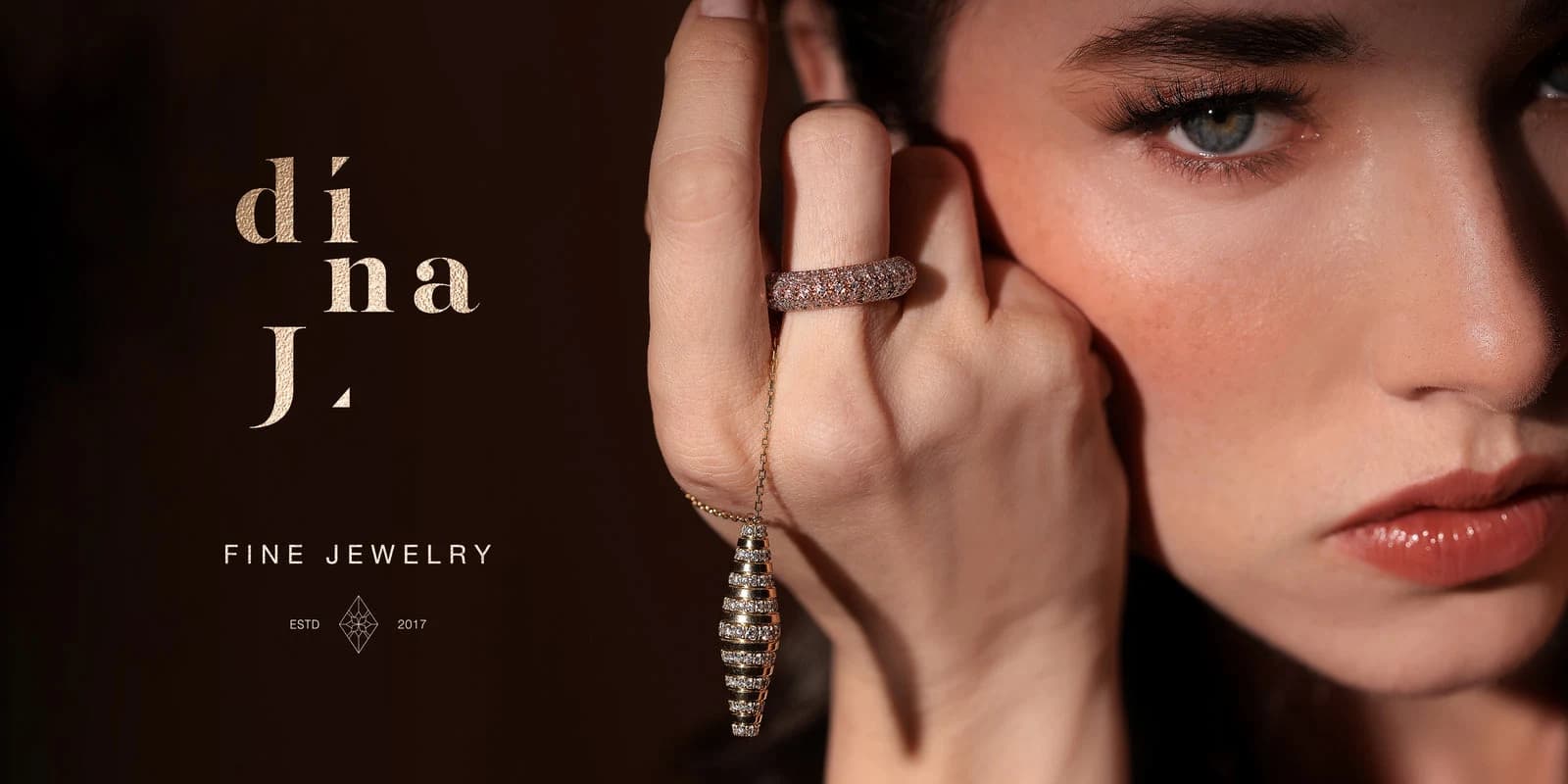 Dina J fine jewelry campaign with sculptural rings and earrings