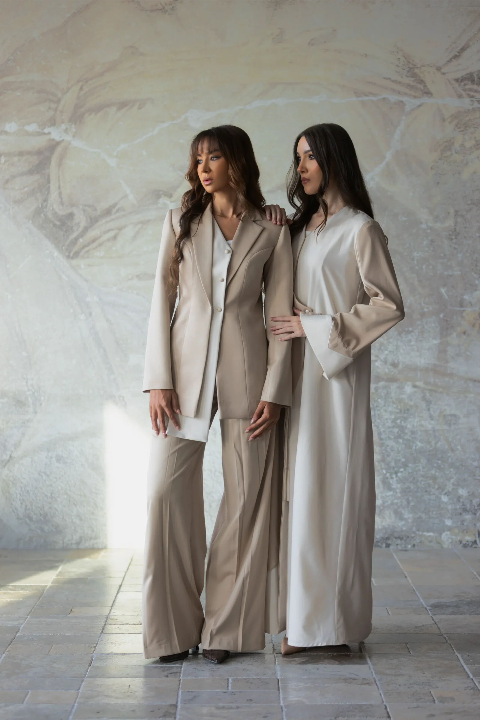 Pearelle campaign models in neutral tailored outfits