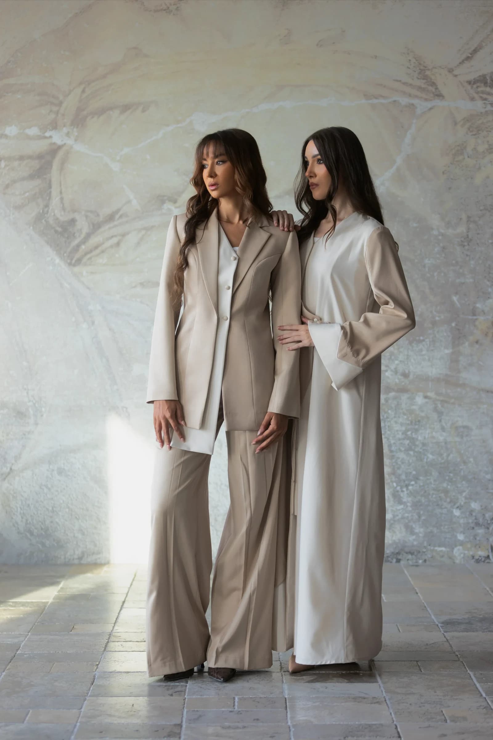 Pearelle campaign models in neutral tailored outfits