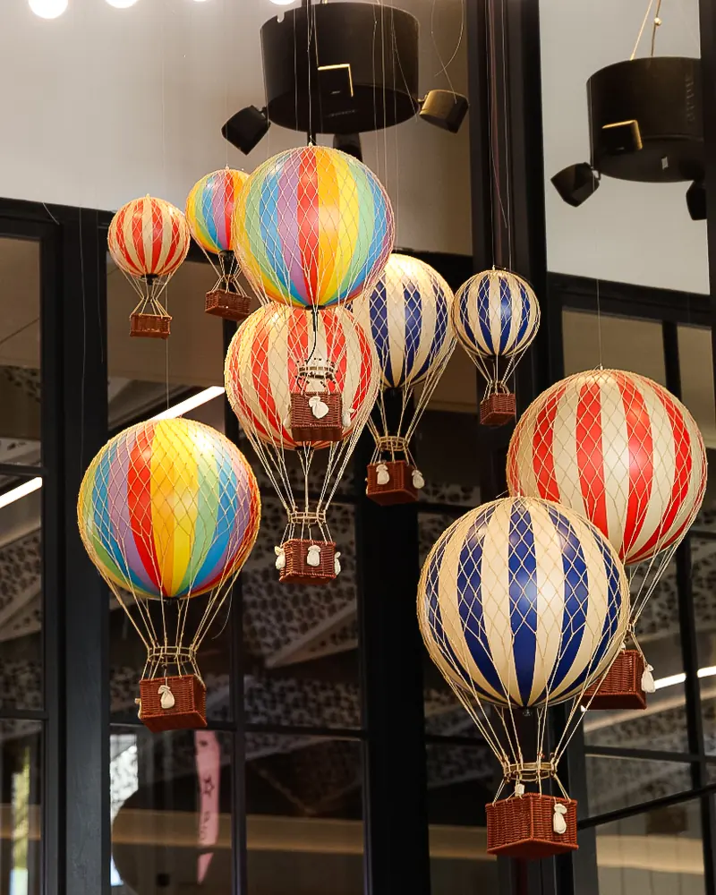 Cities store: model hot-air balloons hanging in the window