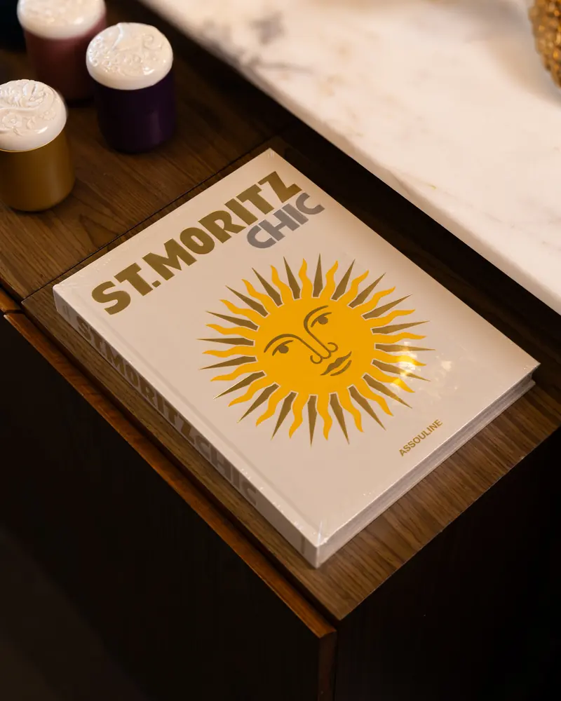 Cities store: the St. Moritz Chic book on a marble counter