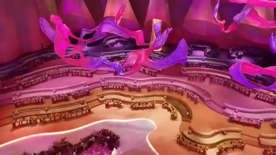 The film that opens the Moements Experience website we built: a venue dressed in pink and violet installations