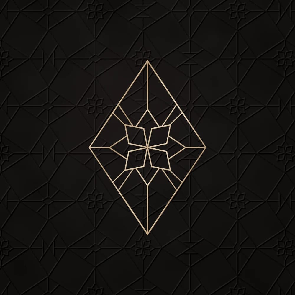 Dina J main emblem in champagne foil, pressed into the brand pattern