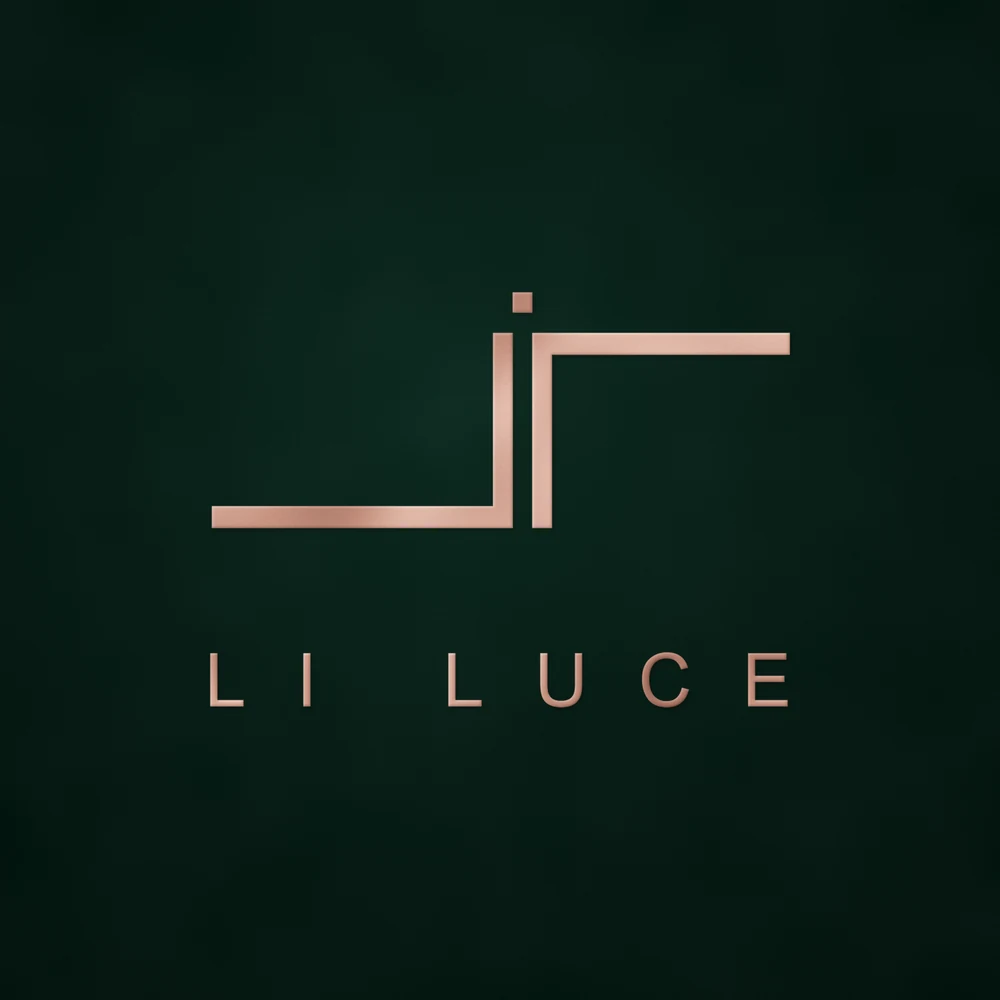 Li Luce logo in rose gold foil on deep green